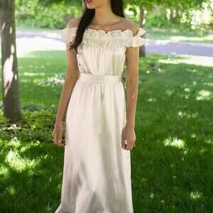 Reformation ivory limoncello dress.  Perfect for bridal wardrobe.  New with tags